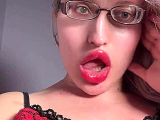 Big lips and long tongue in glossy lipstick tease your cuckold fantasies with dirty joi talk