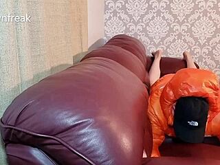 grinding on leather sofa while stroking in north face jacket