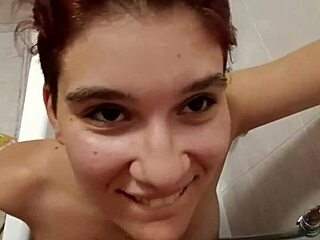chiara's bathroom tease with golden shower on her full tits