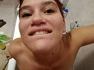 chiara's bathroom tease with golden shower on her full tits
