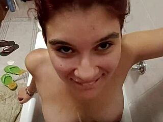 chiara's bathroom tease with golden shower on her full tits