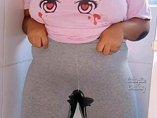 Curvy ebony bbw soaks leggings in hot pee stream solo tease