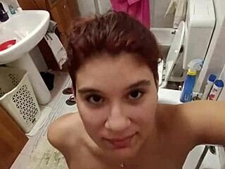 chiara's bathroom tease with golden shower on her full tits