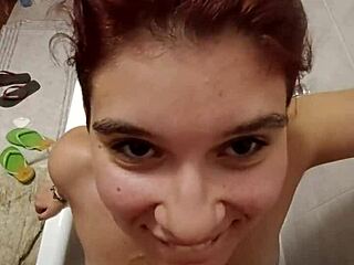 chiara's bathroom tease with golden shower on her full tits