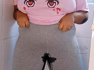 Curvy ebony bbw soaks leggings in hot pee stream solo tease