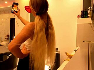 Hot tattooed blonde takes panties off in kitchen to show pussy
