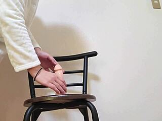 A MARRIED WOMAN MASTURBATES WITH A DILDO