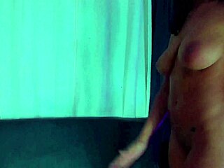 They suck on a brunettes breasts and pinch her nipples