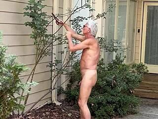 nakedman15 does naked gardening in public