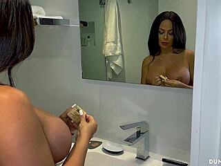 Big tit brunette sucks thick cock in shower