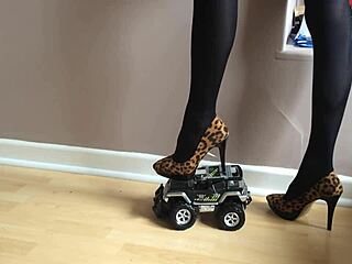 toy car crushed under high heels in garage