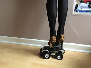 toy car crushed under high heels in garage