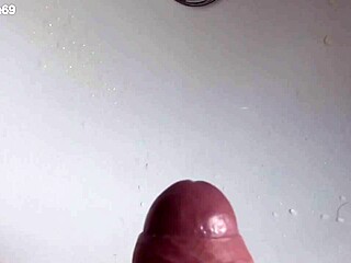 Boy is pissing in the sink and makes stinky farts