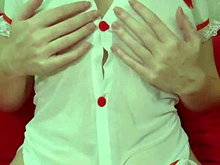 pretty girl in transparent dress and blonde hair plays with her big tits amateur video close-up