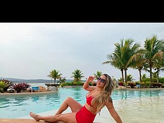 Curvy brazilian beauty relaxing poolside in bikini