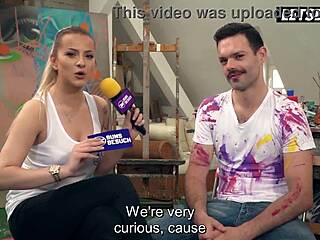 Tattooed blonde shows her big tits to the artist