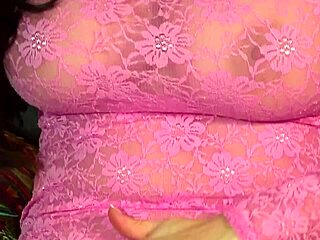 Feeling the intense pleasure as this bodacious brunette babe pops her pussy on the sofa in heels and fishnets.