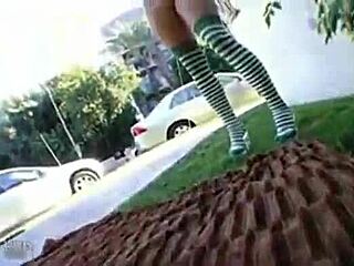 Hey, check out Lily Kingston flashing her nude body in public while masturbating in those green stockings outdoors