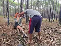 Hot redhead exhibits on trail leading to outdoor sex