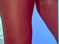 College Desi in sexy dress plays with glass dildo