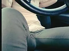 Woman in jeans desperately needs toilet but gets stuck in traffic and wets herself uncontrollably
