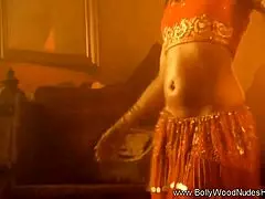 noticing her exotic beauty in sensual indian striptease dance
