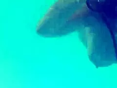 Melissa The Mermaid With Her Tattoo And Brown Eyes By The Pool