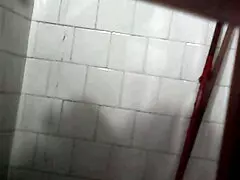 Hidden camera captures a steamy voyeur view of my aunt's private bath moment in full detail