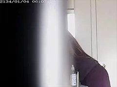 Blonde with big boobs caught changing in a voyeur moment