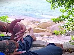 horny african amateur masturbates with handjob to surprise cum orgasm outdoors on public beach