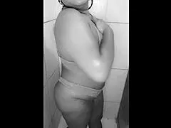 Oh god, the camera caught my hot neighbor masturbating wildly in the bathroom with toys for her lover, squirting everywhere