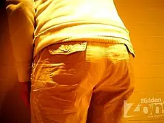 Beautiful girl shows hair on her pussy while peeing standing up in hidden toilet cam.