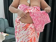 Indian bhabhi reveals her hot boobs in a tantalizing display of curves