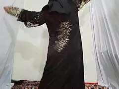 Hey, watch this Arabic slut in black hijab dancing erotically at home, shaking her small tits and curvy ass to music.