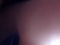 latina woman in skirt riding on the public bus