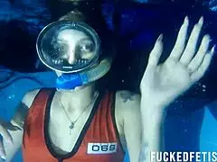 Helen Star models sexy swimwear during night apnea session in the pool