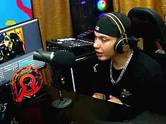 Bruna Lambertini sits naked on Ruan's lap after his kiss request in podcast interview