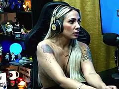 Bruna Lambertini sits naked on Ruan's lap after his kiss request in podcast interview