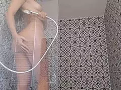 in this casual story, a sexy brazilian housewife takes a steamy shower, dancing sensually with her big ass and lingerie in the bathroom.