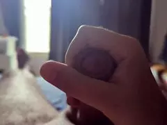 Amateur Bedroom Masturbation Glows Under Suggestive Sun Rays