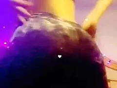 She lights up smokes while slowly stripping clothes off seductively