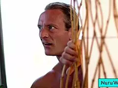 sexy bbw brunette masseuse mona azar rubs big natural tits on clarke kent in wet nuru