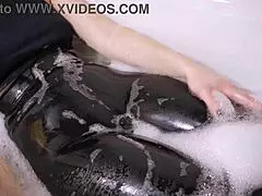 Stepsis shows off her snug outline in tight leather pants by the pool