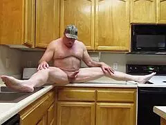 bare skin cooking freely in the kitchen