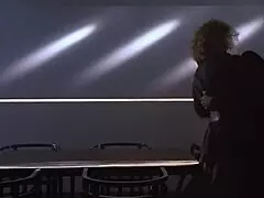 Kim basinger strips and teases on antique desk.