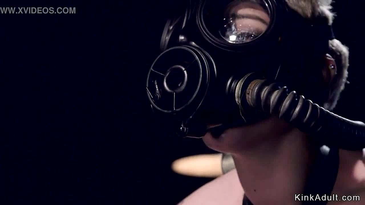 Blonde slave endures torment with gas mask in intense session